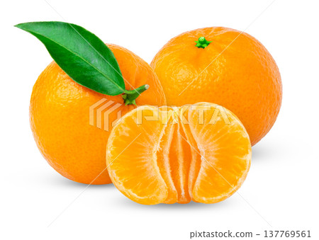 Ripe tangerine fruits and peeled half a clementine with leaf. Fresh mandarin fruit with leaves on white background. Ripe tangerine fruits and peeled half a clementine with leaf. Fresh mandarin fruit with leaves on white background. 137769561
