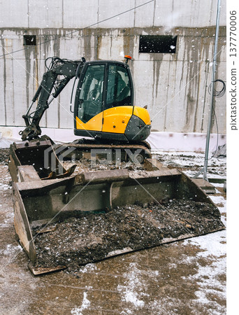 Compact excavator working at 137770006