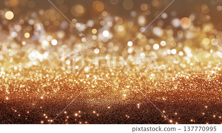 A dreamy background material featuring sparkling golden glitter and a bokeh effect. 137770995