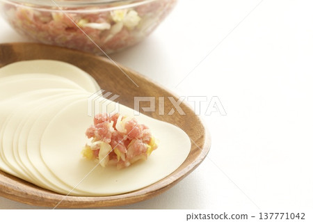 Dumplings while cooking Dumplings while cooking 137771042