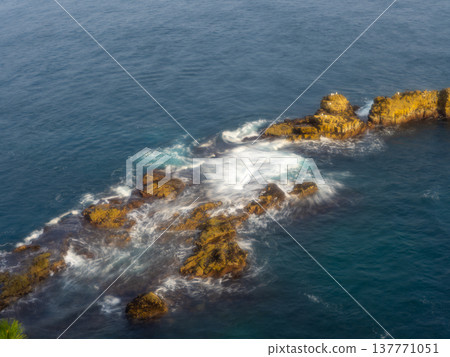Waves on the rocky shore Waves on the rocky shore 137771051