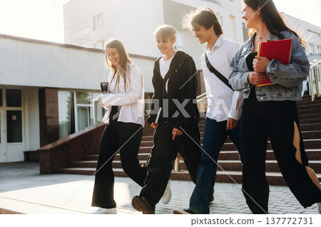 University building behind. Group of students are together 137772731