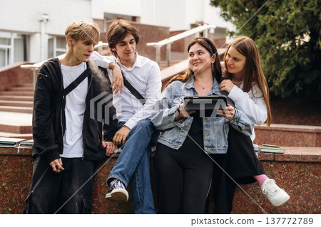 Feeling good, smiling. Group of students are near university together 137772789