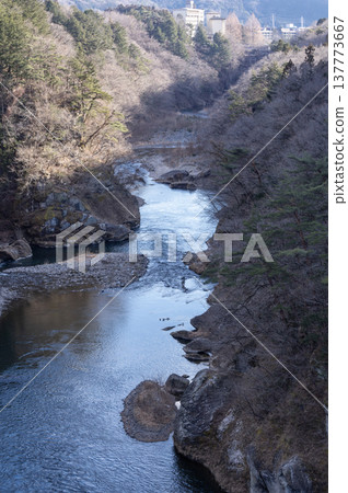 A view of the Nasu-Shiobara Kinugawa River gorge and hot spring town in early spring. A view of the Nasu-Shiobara Kinugawa River gorge and hot spring town in early spring. 137773667