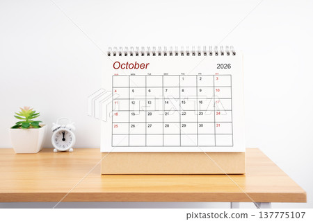 October 2026, Monthly desk calendar for 2026 year on wooden table. October 2026, Monthly desk calendar for 2026 year on wooden table. 137775107