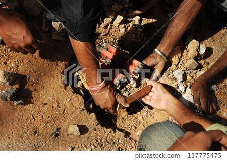 time bomb placed on a dusty mud road time bomb placed on a dusty mud road 137775475