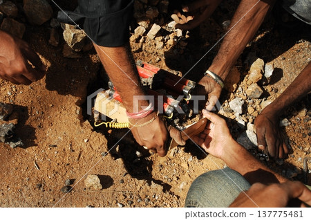 time bomb placed on a dusty mud road time bomb placed on a dusty mud road 137775481