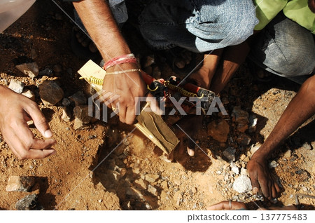 time bomb placed on a dusty mud road time bomb placed on a dusty mud road 137775483