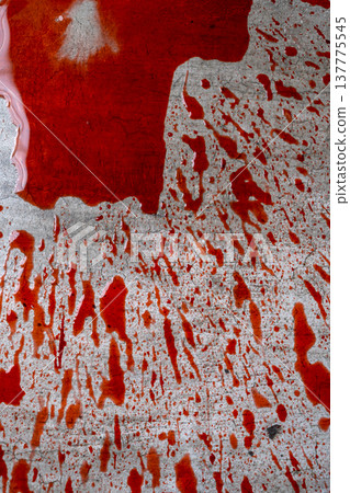 Intense red blood splatters and a pool on a textured gray concrete floor, creating a dramatic and suspenseful atmosphere for crime scene or horror concepts Intense red blood splatters and a pool on a textured gray concrete floor, creating a dramatic and suspenseful atmosphere for crime scene or horror concepts 137775545