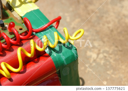 time bomb placed on a dusty mud road time bomb placed on a dusty mud road 137775621