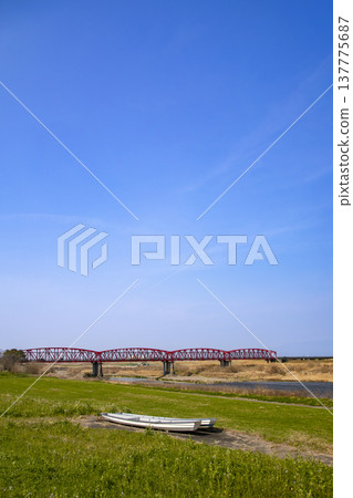 The red Chikugo River Bridge stands out against the blue sky. The red Chikugo River Bridge stands out against the blue sky. 137775687