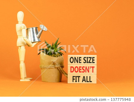 One size does not fit all symbol. Concept words One size does not fit all on beautiful wooden blocks. Beautiful orange background. Business one size does not fit all concept. Copy space. One size does not fit all symbol. Concept words One size does not fit all on beautiful wooden blocks. Beautiful orange background. Business one size does not fit all concept. Copy space. 137775948