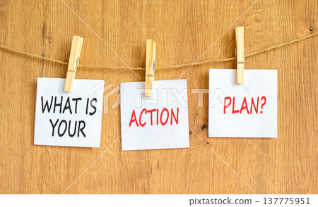 What is your action plan symbol. Concept words What is your action plan on beautiful white papers on clothespin. Beautiful wooden background. Business what is your action plan concept. Copy space. What is your action plan symbol. Concept words What is your action plan on beautiful white papers on clothespin. Beautiful wooden background. Business what is your action plan concept. Copy space. 137775951