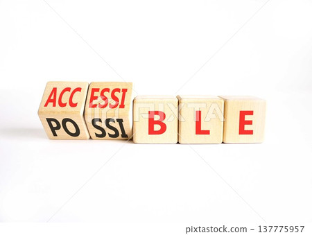 Accessible or possible symbol. Concept words Accessible or Possible on beautiful wooden blocks. Beautiful white table white background. Business accessible or possible concept. Copy space. 137775957