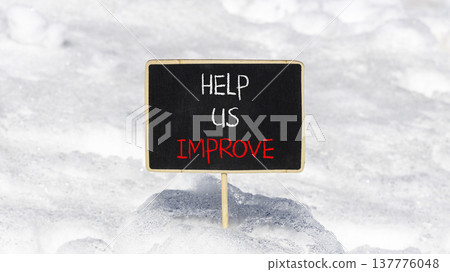 Help us improve symbol. Concept words Help us improve on beautiful black yellow blackboard. Beautiful white snow background. Business motivational help us improve concept. Copy space. Help us improve symbol. Concept words Help us improve on beautiful black yellow blackboard. Beautiful white snow background. Business motivational help us improve concept. Copy space. 137776048