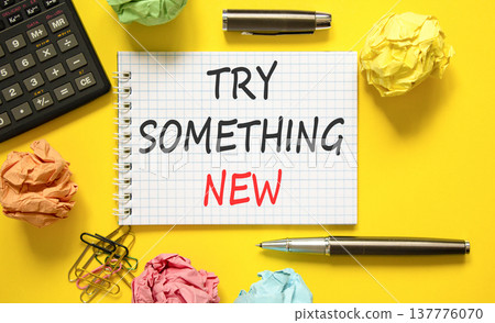 Try something new symbol. Concept words Try something new on beautiful note. Black pen. Calculator. Beautiful yellow background. Business motivational lifestyle try something new concept. Copy space. Try something new symbol. Concept words Try something new on beautiful note. Black pen. Calculator. Beautiful yellow background. Business motivational lifestyle try something new concept. Copy space. 137776070
