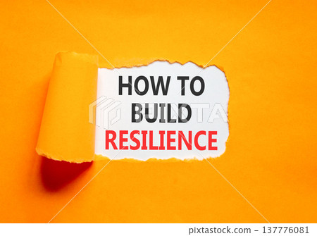 How to build resilience symbol. Concept words How to build resilience on beautiful white paper. Beautiful orange paper background. Business how to build resilience concept. Copy space. How to build resilience symbol. Concept words How to build resilience on beautiful white paper. Beautiful orange paper background. Business how to build resilience concept. Copy space. 137776081