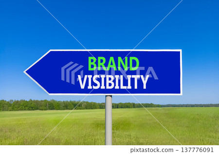 Brand visibility symbol. Concept words Brand visibility on beautiful blue road sign. Beautiful blue sky green grass field background. Business branding and brand visibility concept. Copy space. Brand visibility symbol. Concept words Brand visibility on beautiful blue road sign. Beautiful blue sky green grass field background. Business branding and brand visibility concept. Copy space. 137776091