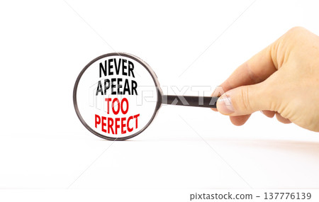 Never appear too perfect symbol. Concept words Never appear too perfect on beautiful magnifying glass. Beautiful white table white background. Business and never appear too perfect concept. Copy space Never appear too perfect symbol. Concept words Never appear too perfect on beautiful magnifying glass. Beautiful white table white background. Business and never appear too perfect concept. Copy space 137776139