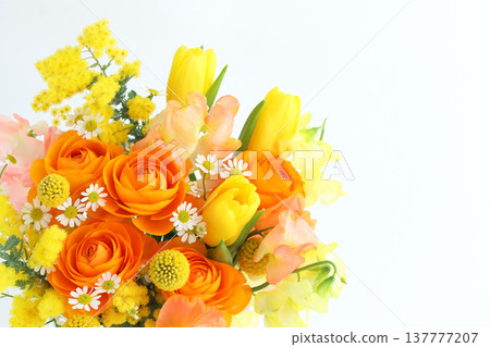 Flower arrangement with mimosa, orange and yellow. Flower arrangement with mimosa, orange and yellow. 137777207