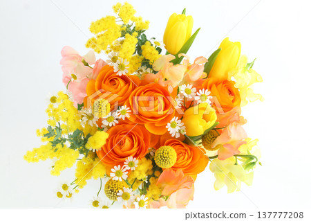 Flower arrangement with mimosa, orange and yellow. 137777208