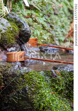 The water basin at the inner shrine of Kifune Shrine The water basin at the inner shrine of Kifune Shrine 137777892