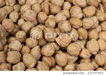 Macro texture of organic raw chickpea seeds. Macro texture of organic raw chickpea seeds. 137777953