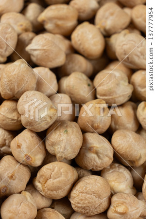 Macro texture of organic raw chickpea seeds. Macro texture of organic raw chickpea seeds. 137777954