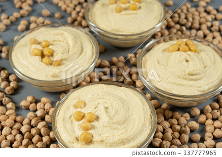 Vegan appetizer hummus garnished with boiled chickpeas. Vegan appetizer hummus garnished with boiled chickpeas. 137777965