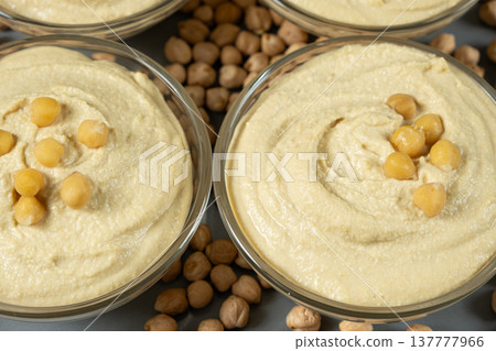 Vegan appetizer hummus garnished with boiled chickpeas. Vegan appetizer hummus garnished with boiled chickpeas. 137777966