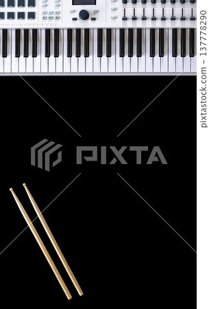 Musical background with musical keys on black, flat lay, copy space. 137778290