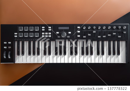 Music keys, synthesizer on a colored background, flat lay. 137778322