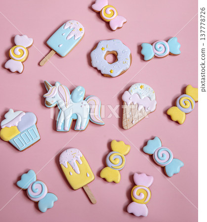 Colorful gingerbread cookies in colored glaze of different shapes. 137778726