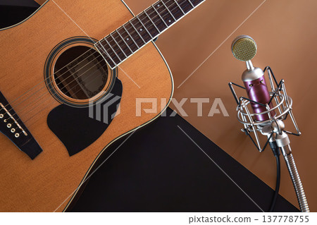 Flat lay, music background with acoustic guitar. Flat lay, music background with acoustic guitar. 137778755