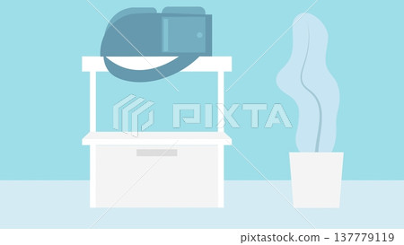 Close-up in a blue room, on a nightstand where a backpack lies on top of a nightstand and next to it is a flower in a pot. Close-up in a blue room, on a nightstand where a backpack lies on top of a nightstand and next to it is a flower in a pot. 137779119
