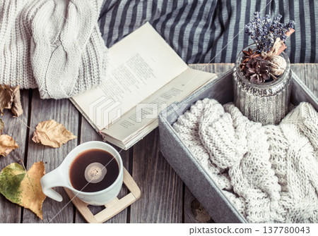 autumn still life with a cup of coffee 137780043