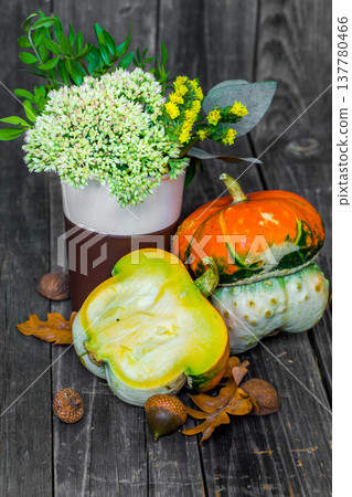 small pumpkin on wooden background, autumn small pumpkin on wooden background, autumn 137780466