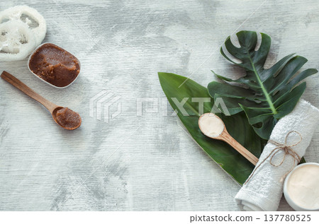 Spa composition with body care items on a light background. Spa composition with body care items on a light background. 137780525