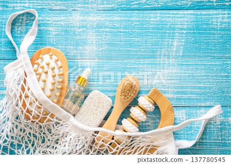 Spa composition with personal care items for body in a shopping bag, top view. 137780545