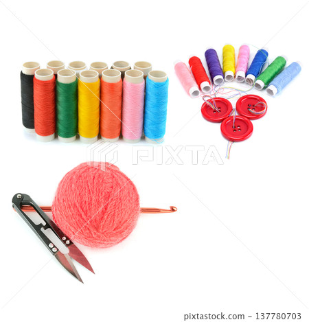 Collage of sewing and knitting supplies featuring colorful thread spools, red buttons with needles, a pink yarn ball, crochet hook, and snips isolated on a white background. Collage of sewing and knitting supplies featuring colorful thread spools, red buttons with needles, a pink yarn ball, crochet hook, and snips isolated on a white background. 137780703