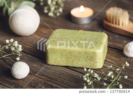 Spa composition with soap, bath bombs, candle and dried flowers. Spa composition with soap, bath bombs, candle and dried flowers. 137780814
