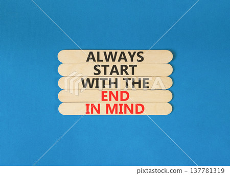Start with the end in mind symbol. Concept words Always start with the end in mind on beautiful wooden sticks. Beautiful blue background. Business start with the end in mind concept. Copy space. 137781319