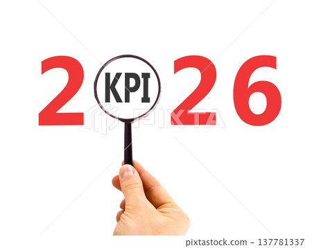 2026 KPI key performance indicator symbol. Concept words 2026 KPI in magnifying glass. Beautiful white background. Businessman's hand. Business 2026 KPI key performance indicator concept. Copy space. 137781337