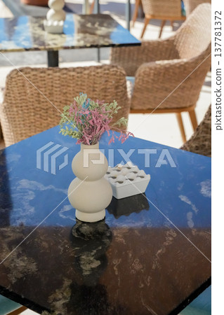 Cafe Table with Flower Vase Close Up Cafe Table with Flower Vase Close Up 137781372