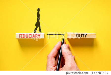 Fiduciary duty words symbol. Concept words Fiduciary duty on beautiful wooden blocks. Beautiful yellow background. Businessman hand. Business and Fiduciary duty words concept. Copy space. Fiduciary duty words symbol. Concept words Fiduciary duty on beautiful wooden blocks. Beautiful yellow background. Businessman hand. Business and Fiduciary duty words concept. Copy space. 137781397
