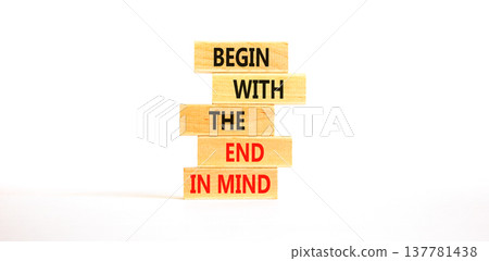 Begin with the end in mind symbol. Concept words Begin with the end in mind on beautiful wooden blocks. Beautiful white paper background. Business begin with the end in mind concept. Copy space. Begin with the end in mind symbol. Concept words Begin with the end in mind on beautiful wooden blocks. Beautiful white paper background. Business begin with the end in mind concept. Copy space. 137781438