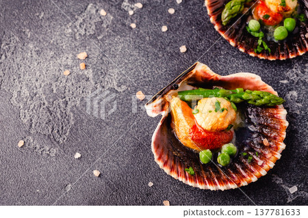 Cooked scallops with vegetables Cooked scallops with vegetables 137781633