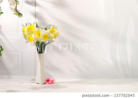 Abstract spring floral arrangement, a still life with beautiful blooming daffodils and banner with space for text. A card for Mother's Day, International Women's Day, birthdays, weddings, Abstract spring floral arrangement, a still life with beautiful blooming daffodils and banner with space for text. A card for Mother's Day, International Women's Day, birthdays, weddings, 137782045