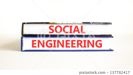 Social engineering words symbol. Concept words Social engineering on beautiful books. Beautiful white background. Business and Social engineering words concept. Copy space. Social engineering words symbol. Concept words Social engineering on beautiful books. Beautiful white background. Business and Social engineering words concept. Copy space. 137782417
