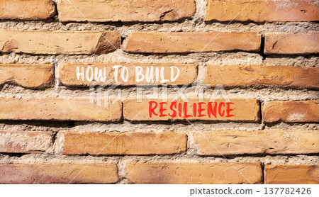 How to build resilience symbol. Concept words How to build resilience on beautiful brick wall. Beautiful brick wall background. Business how to build resilience concept. Copy space. How to build resilience symbol. Concept words How to build resilience on beautiful brick wall. Beautiful brick wall background. Business how to build resilience concept. Copy space. 137782426